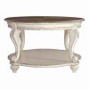 Two Tone Oval Cocktail Table with Bottom Shelf, Antique White and Brown